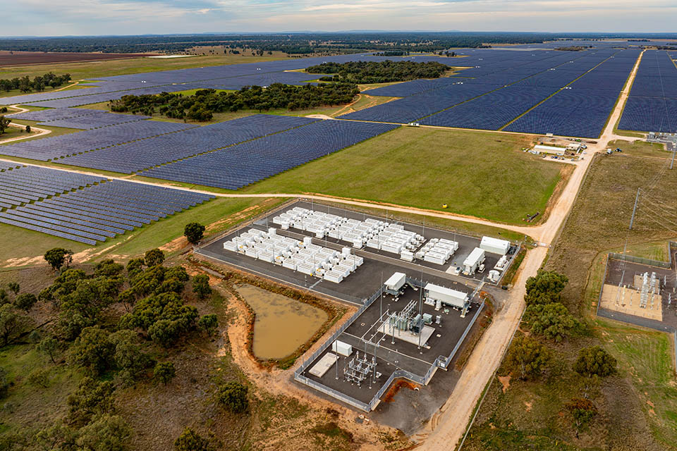 The Darlington Point Solar Farm, operated by Octopus Australia, represents one of the largest solar power installations in the country. Located in New South Wales, this expansive solar farm harnesses the power of the sun to generate clean, renewable energy on a massive scale. The aerial image captures the vast array of solar panels extending towards the horizon, illuminated by the rising sun, symbolizing the dawn of a sustainable energy future. The farm's strategic design and integration into the local grid contribute significantly to reducing carbon emissions and supporting Australia's transition to renewable energy sources.