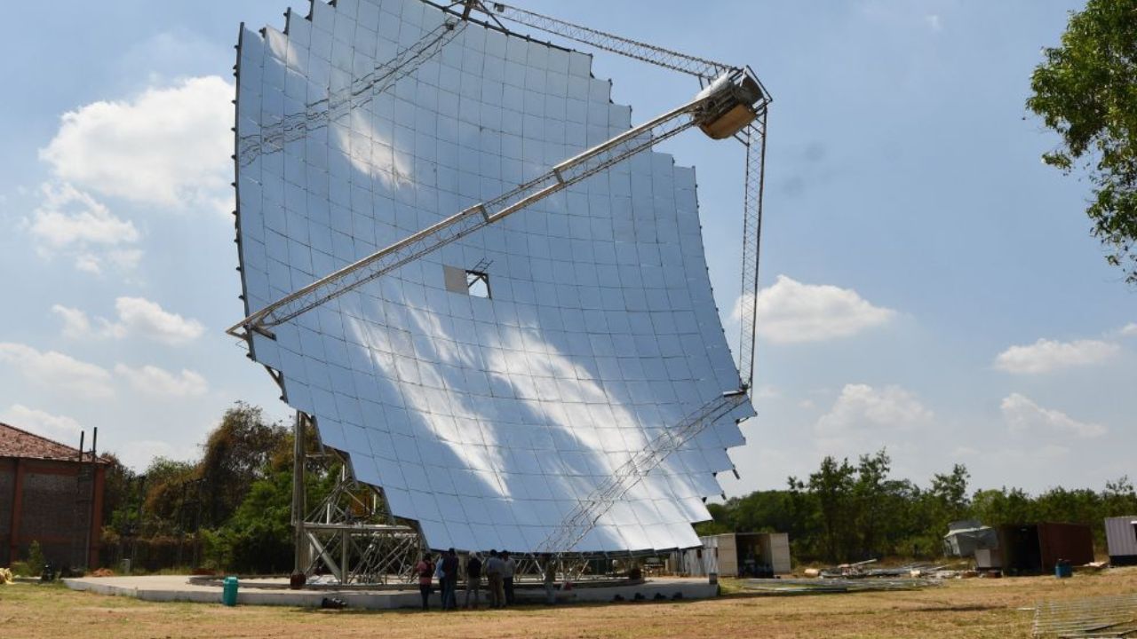 A large parabolic dish of solar reflectors