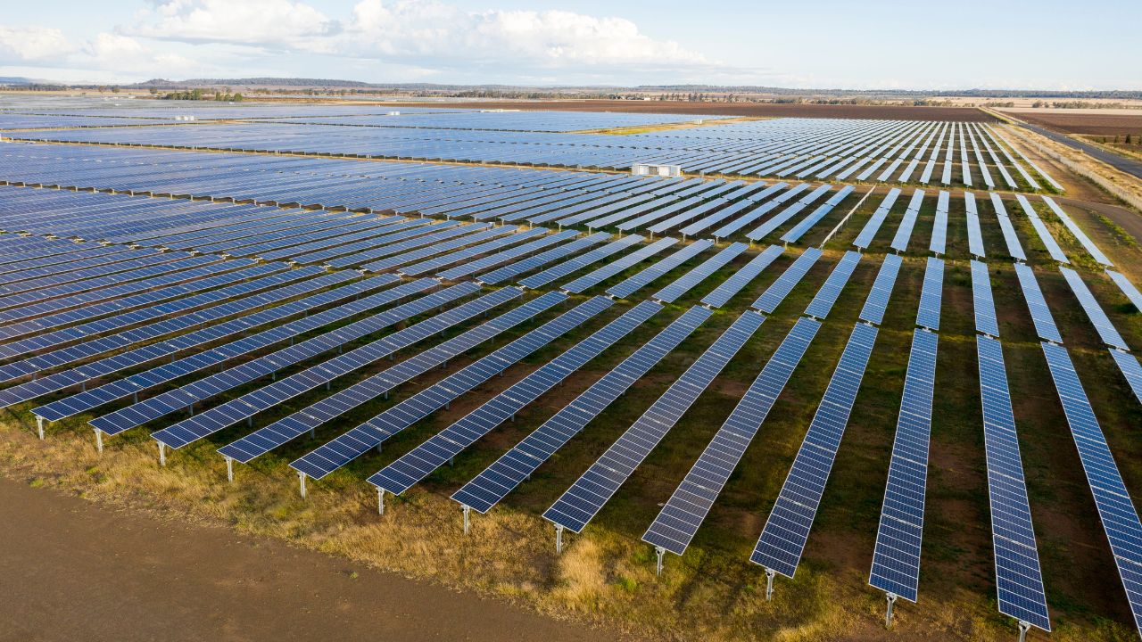 Several fields of solar panel arrays in a solar farm in Queensland