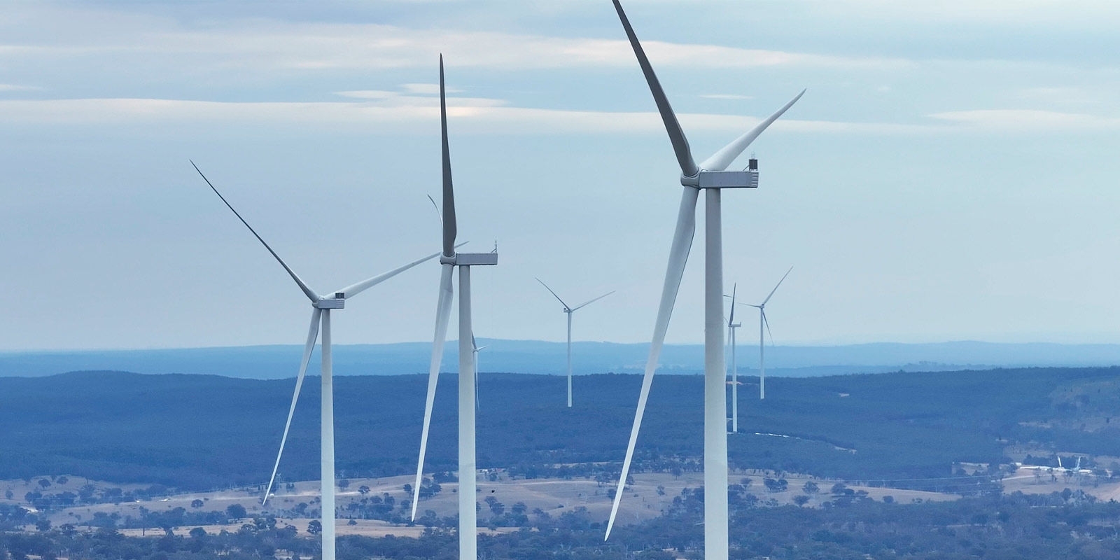 windfarm with hills in the distance