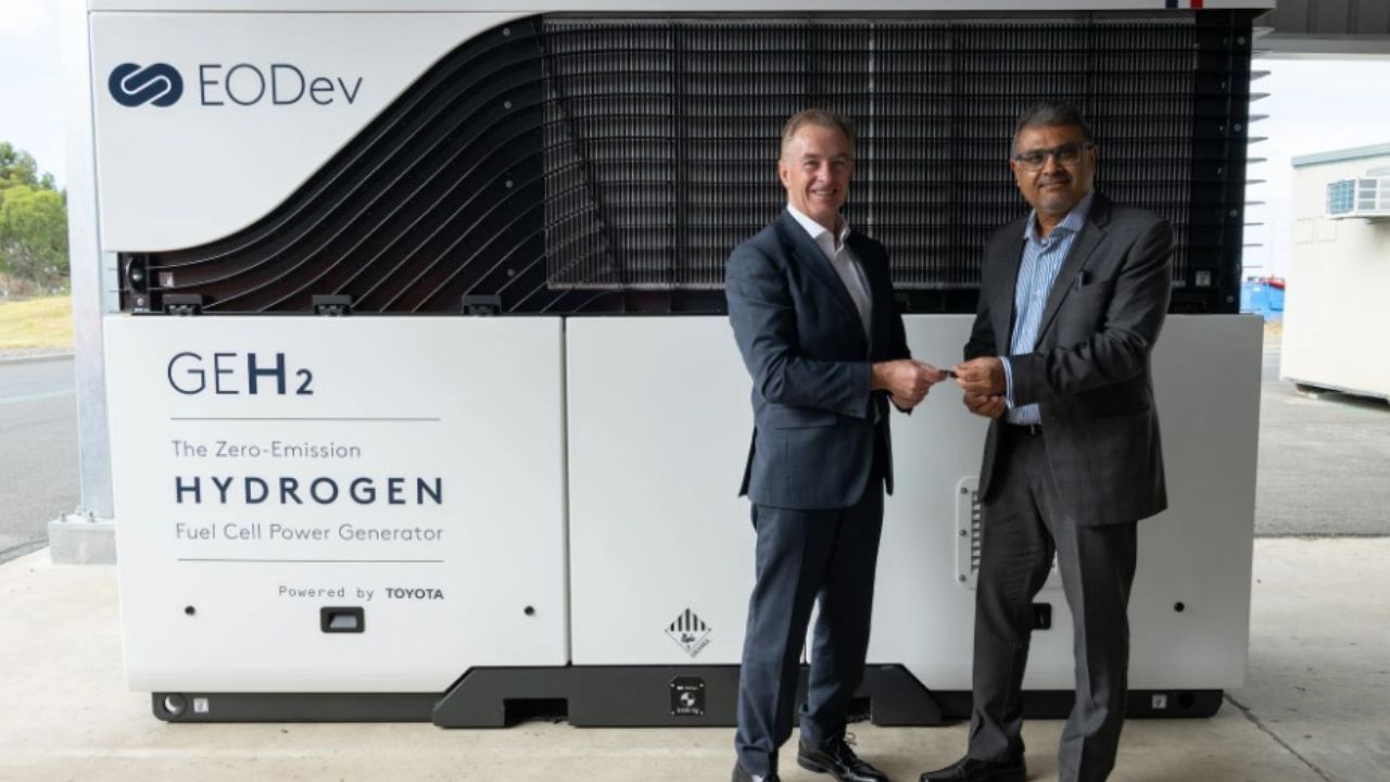 Toyota Australia President and CEO Matthew Callachor (left) handing over the keys of the first EODev GEH2® generator assembled at Toyota’s Altona facility to Thiess Group Executive - Assets, Autonomy & Digital, Ramesh Liyanage. Credit: Toyota Australia.
